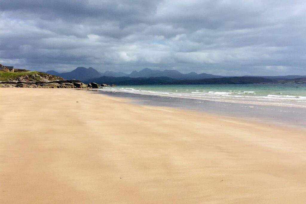 Big Sand Beach with mountains in the distance